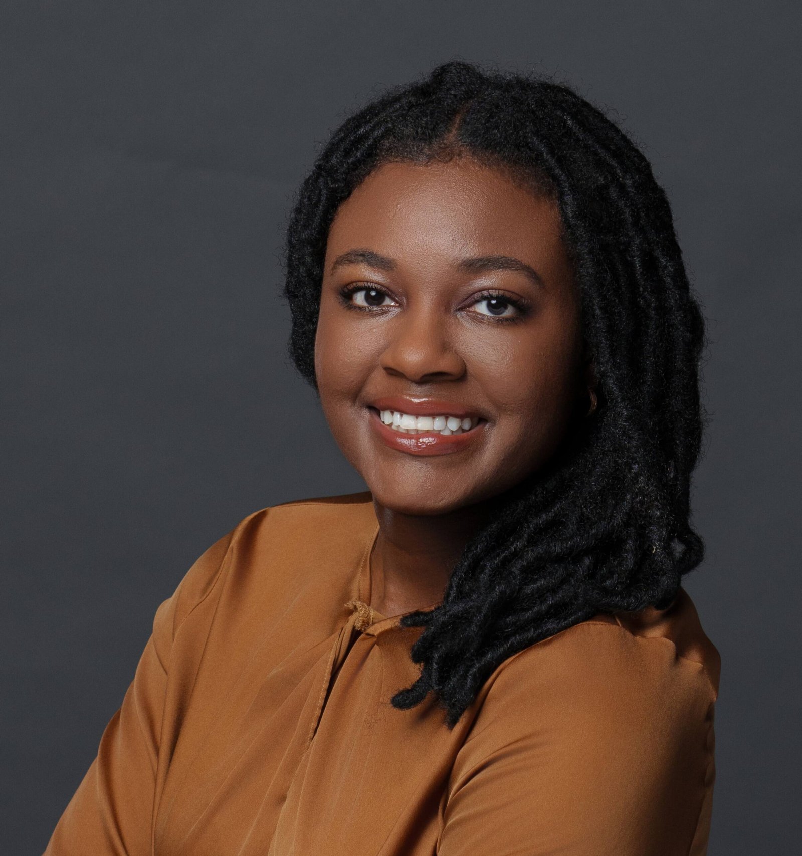 Headshot of Chelsea Dade, founder of Communicate For Health Justice.